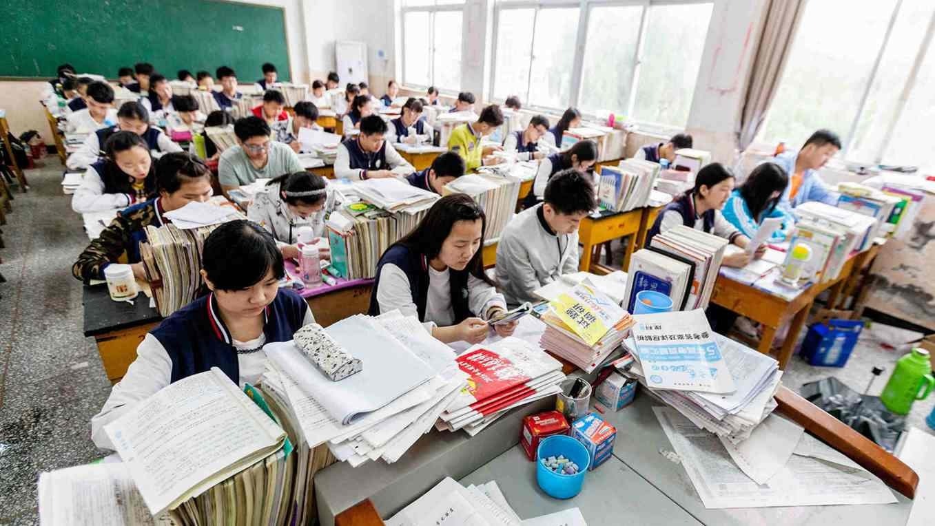 Trường tiểu học Trung Quốc yêu cầu học sinh không làm bài tập sau 9 giờ tối để có thể ngủ nhiều hơn - Ảnh 2.