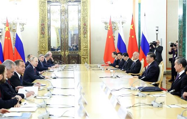 Tổng thống Nga tiếp Bộ trưởng Quốc phòng Trung Quốc - Ảnh 1.