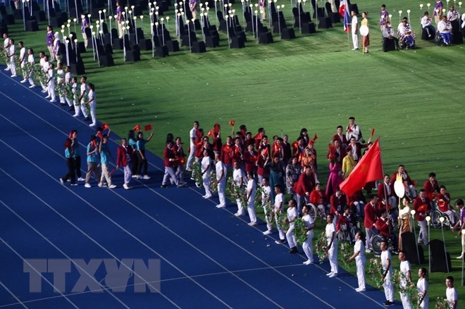 Lễ khai mạc ASEAN Para Games 12: Ngọn đuốc đã thắp sáng - Ảnh 3.