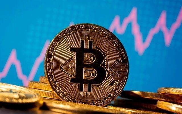 Bitcoin lần đầu tiên vượt mốc 100.000 USD - Ảnh 1.