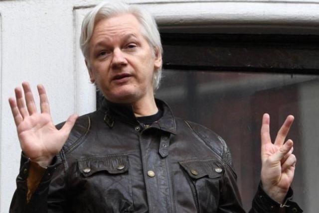 Nhà sáng lập WikiLeaks chính thức nhận tội - Ảnh 1.