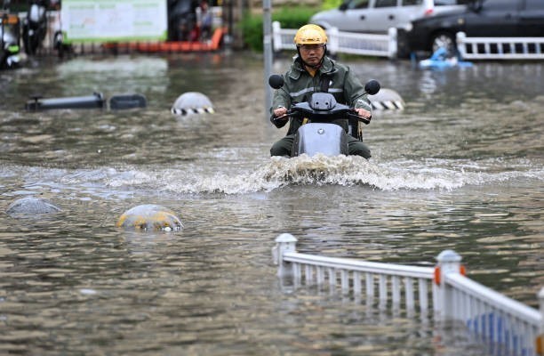 Mưa lũ gây thiệt hại lớn tại Thái Lan và Trung Quốc - Ảnh 3.