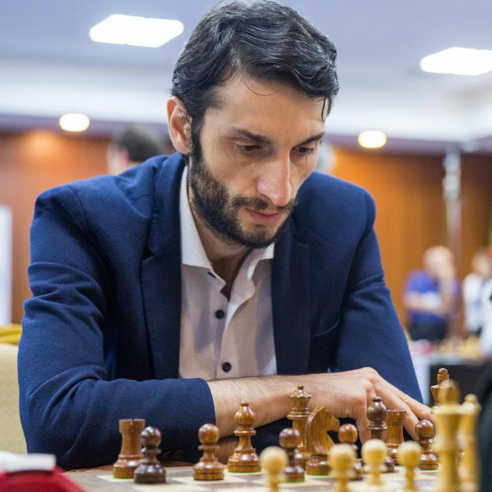 Lê Quang Liêm xuất sắc thắng kỳ thủ vô địch Olympiad, giành vé đi tiếp ở giải đấu trị giá 52 tỷ đồng - Ảnh 2. Lê Quang Liêm xuất sắc thắng kỳ thủ vô địch Olympiad, giành vé đi tiếp ở giải đấu trị giá 52 tỷ đồng - Ảnh 2.