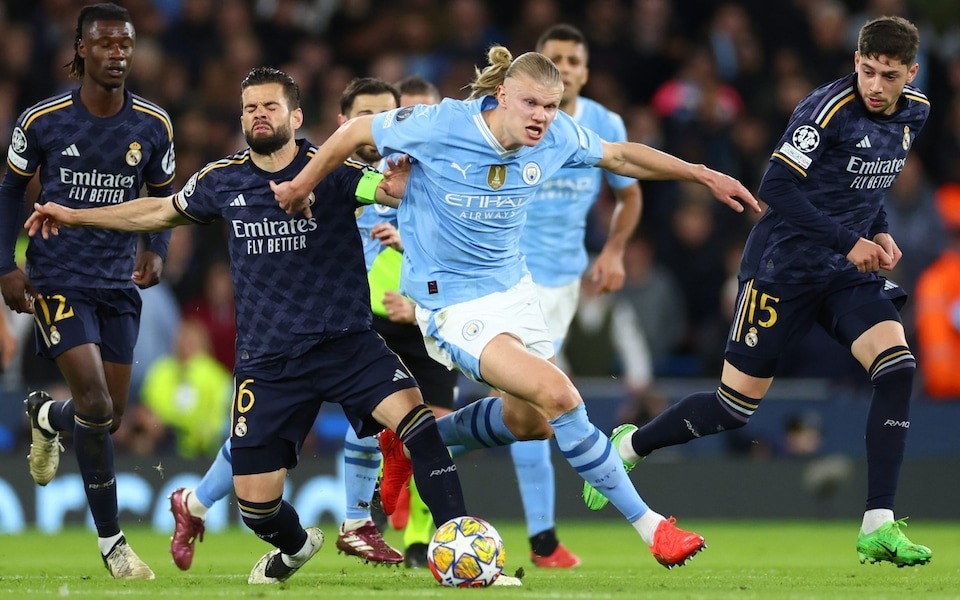 Lượt đi play-off vòng 1/8 Champions League, Man City và Real Madrid: Hai gã khổng lồ muốn đập tan trật tự bóng đá - Ảnh 1.