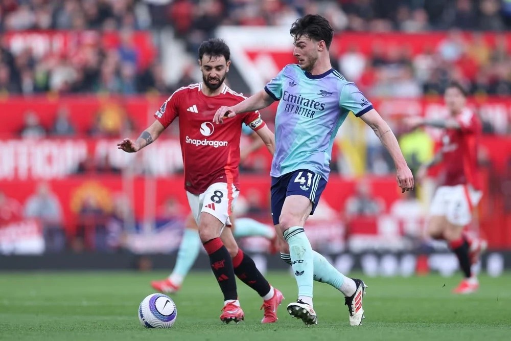 MU đụng ngay Arsenal ở trận mở màn Ngoại hạng Anh mùa giải 2025-26 - Ảnh 1. MU đụng ngay Arsenal ở trận mở màn Ngoại hạng Anh mùa giải 2025-26 - Ảnh 1.