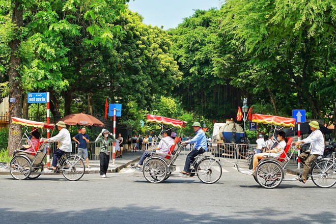 Dự báo thời tiết ngày 14/7: Nhiều khu vực ngày nắng, chiều tối và đêm mưa dông - Ảnh 3.