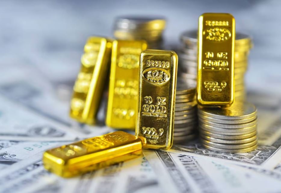 Giá vàng giảm hơn 1% sau khi Fed giữ nguyên lãi suất - Ảnh 1.