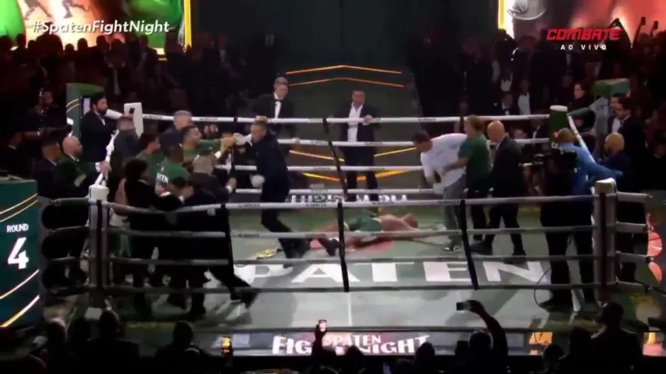 Huyền thoại UFC bị hạ knock-out bởi… một người đàn ông mặc tuxedo trong vụ hỗn chiến tại võ đài - Ảnh 3.