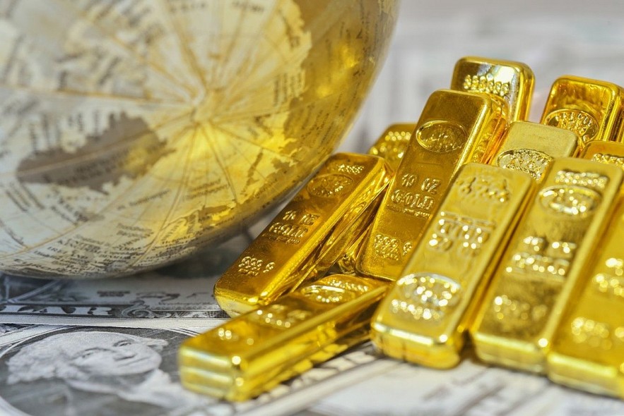 Giá vàng trong nước giảm, giá thế giới bứt phá khỏi mốc 3.600 USD/ounce - Ảnh 1.