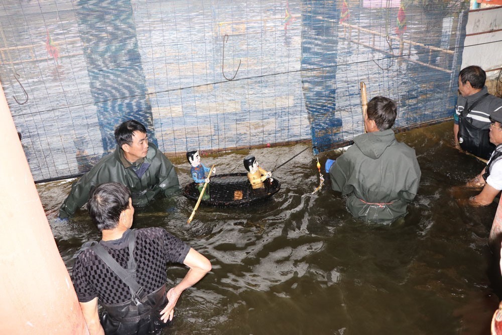 Những người "giữ lửa" cho múa rối nước Hồng Phong - Ảnh 8. Những người "giữ lửa" cho múa rối nước Hồng Phong - Ảnh 8.