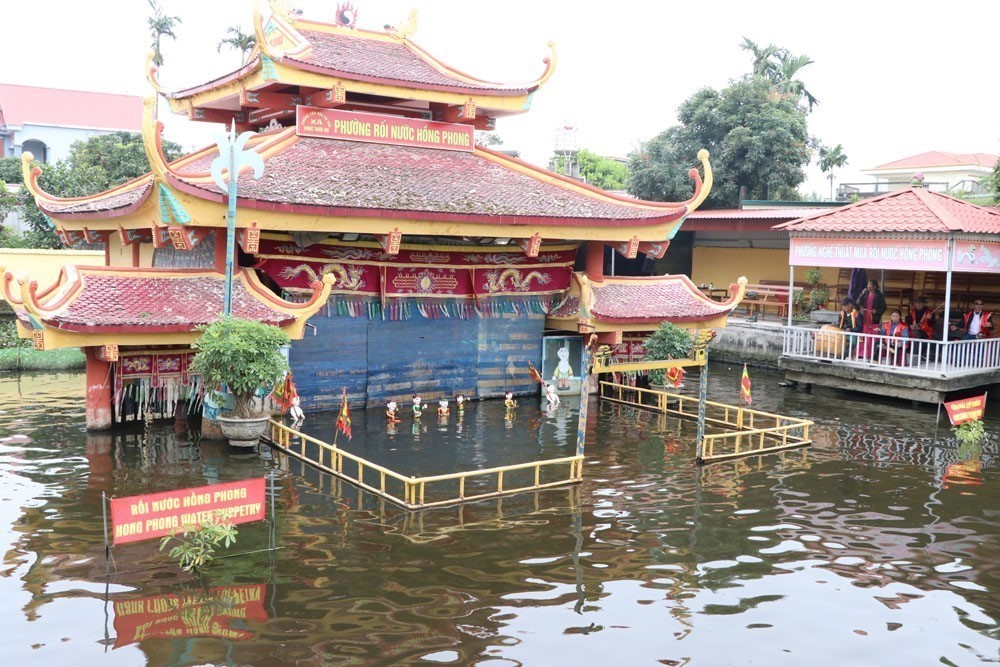 Những người "giữ lửa" cho múa rối nước Hồng Phong - Ảnh 2. Những người "giữ lửa" cho múa rối nước Hồng Phong - Ảnh 2.