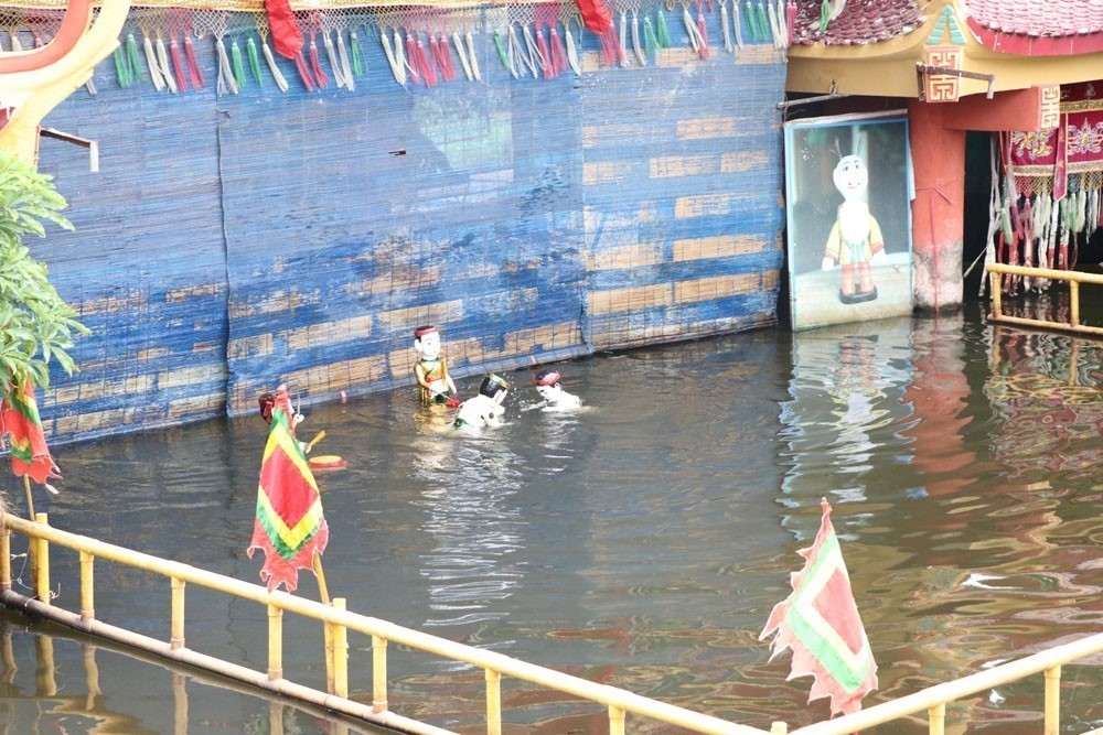 Những người "giữ lửa" cho múa rối nước Hồng Phong - Ảnh 4. Những người "giữ lửa" cho múa rối nước Hồng Phong - Ảnh 4.