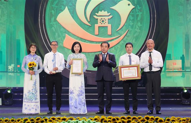 Giải báo chí về Phát triển văn hóa và xây dựng người Hà Nội thanh lịch, văn minh lần thứ IX: TTXVN giành giải cơ quan xuất sắc có nhiều tác phẩm báo chí chất lượng cao - Ảnh 1. Giải báo chí về Phát triển văn hóa và xây dựng người Hà Nội thanh lịch, văn minh lần thứ IX: TTXVN giành giải cơ quan xuất sắc có nhiều tác phẩm báo chí chất lượng cao - Ảnh 1.