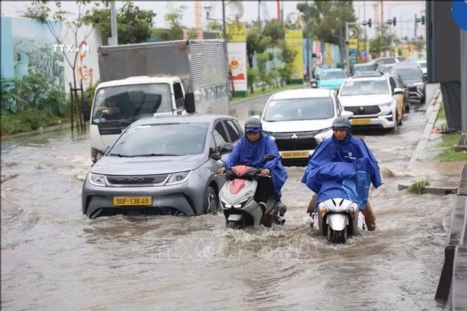 TP. Hồ Chí Minh trước nguy cơ ngập kéo dài cuối năm do triều cường - Ảnh 2.