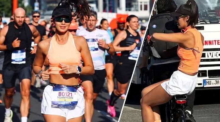 Nữ runner Trung Quốc bị tước thành tích vì đi nhờ xe đạp ở Berlin Marathon - Ảnh 1. Nữ runner Trung Quốc bị tước thành tích vì đi nhờ xe đạp ở Berlin Marathon - Ảnh 1.