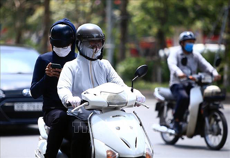 Thời tiết dịp Tết: Đông Nam Bộ có nơi nắng nóng trên 35 độ C - Ảnh 1.