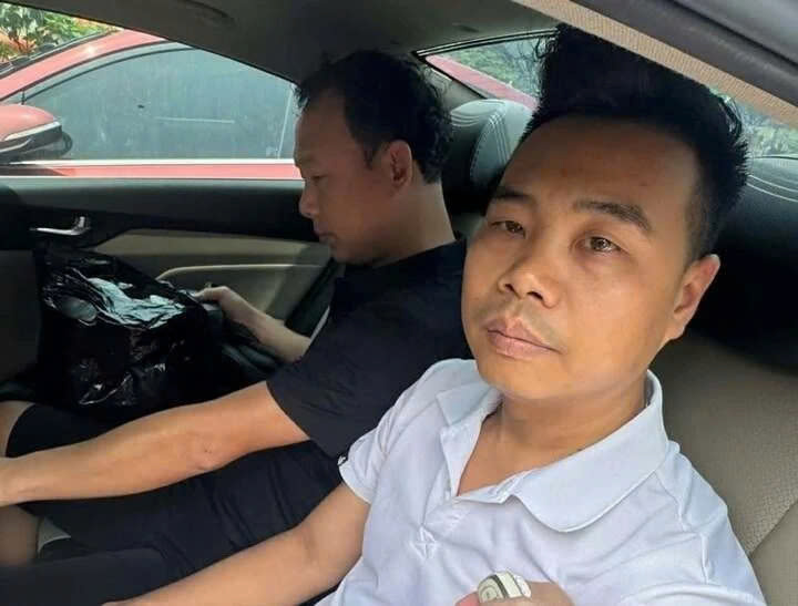 Triệu tập hai đối tượng liên quan vụ hành hung trên đường Nguyễn Khang, Hà Nội - Ảnh 1.