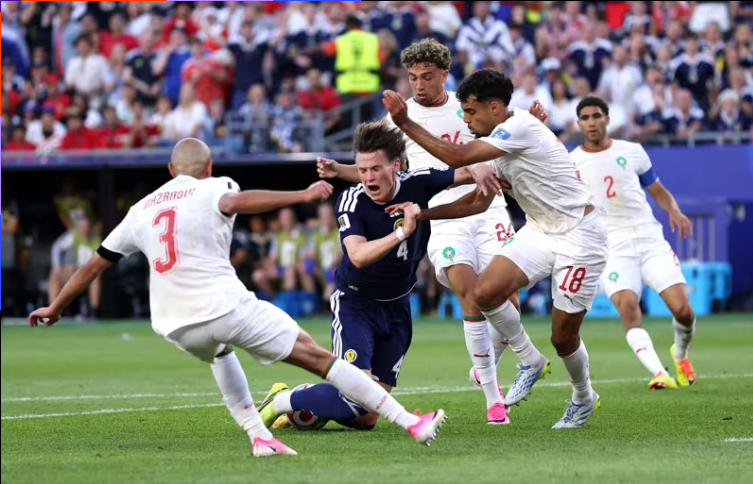 Morocco (áo trắng) cầm bóng 60% trong trận đấu với Scotland. Ảnh: FIFA Morocco (áo trắng) cầm bóng 60% trong trận đấu với Scotland. Ảnh: FIFA