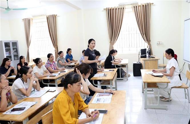 Bộ Giáo dục và Đào tạo yêu cầu địa phương bảo đảm đủ giáo viên sau sắp xếp trường học - Ảnh 1.