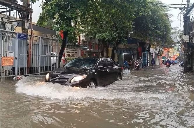 Hà Nội: Trường học linh hoạt hình thức dạy học ứng phó với ngập úng - Ảnh 1. Hà Nội: Trường học linh hoạt hình thức dạy học ứng phó với ngập úng - Ảnh 1.
