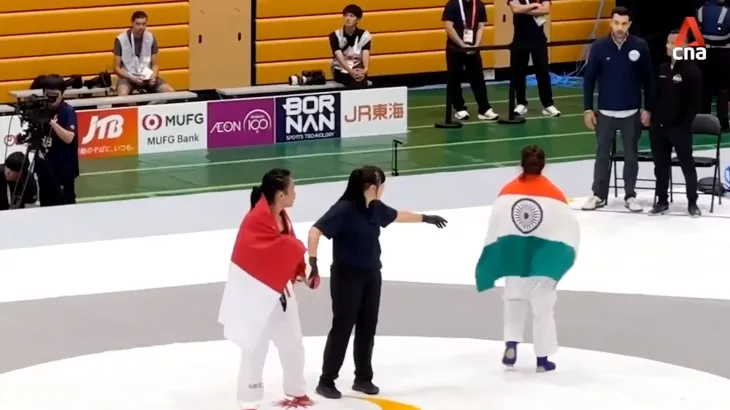 Võ sĩ Ấn Độ gây tranh cãi vì không bắt tay đối thủ sau thất bại tại ASIAD 2026 - Ảnh 1. Võ sĩ Ấn Độ gây tranh cãi vì không bắt tay đối thủ sau thất bại tại ASIAD 2026 - Ảnh 1.