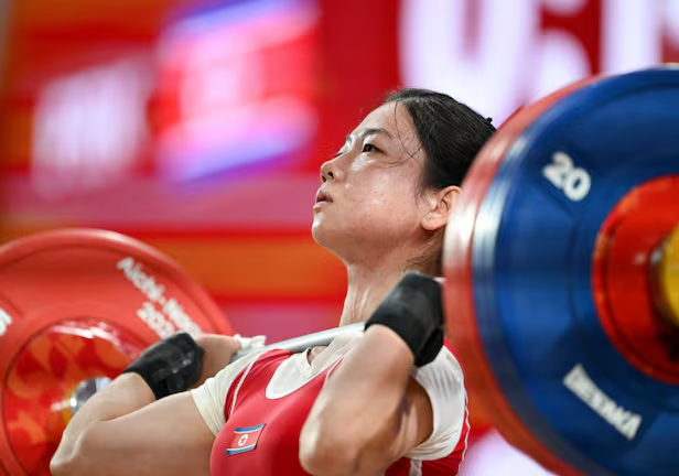 Cử tạ CHDCND Triều Tiên thống trị ASIAD 2026 với 7 HCV và hàng loạt kỷ lục thế giới - Ảnh 2. Cử tạ CHDCND Triều Tiên thống trị ASIAD 2026 với 7 HCV và hàng loạt kỷ lục thế giới - Ảnh 2.