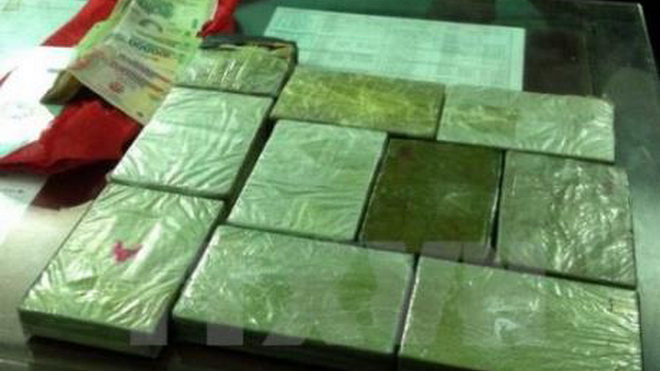 Bắt giam giáo viên tiếng Anh mua bán trái phép 16 bánh heroin