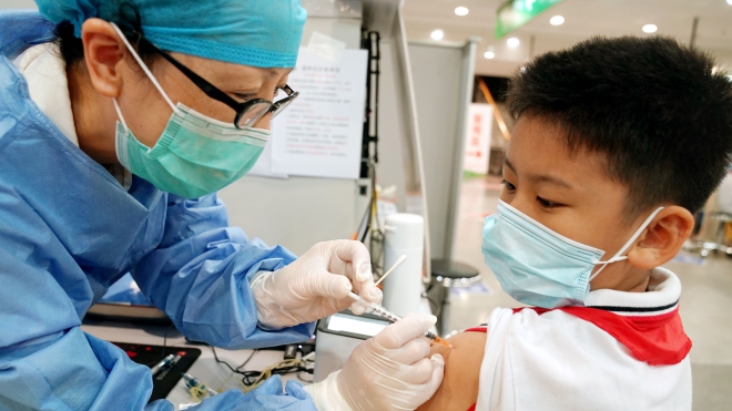 Trung Quốc phát triển vaccine bảo vệ kép trước Covid-19 và bệnh cúm