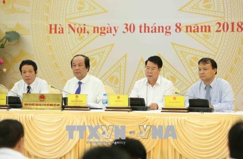 Trong ảnh: Thứ trưởng Bộ Công an Bùi Văn Nam (thứ hai từ phải sang) trả lời câu hỏi của phóng viên. Ảnh: Dương Giang – TTXVN
