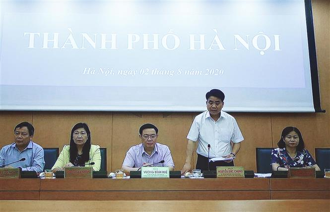 Trong ảnh: Chủ tịch UBND thành phố Hà Nội Nguyễn Đức Chung phát biểu tại điểm cầu Hà Nội. Ảnh: Thống Nhất – TTXVN