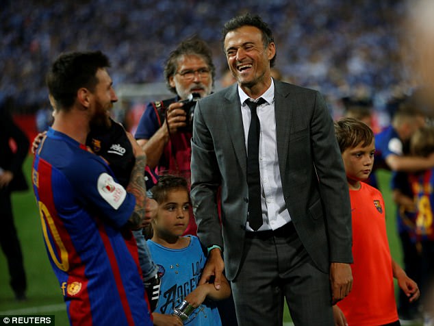 Luis Enrique và Messi lúc vui vẻ bên nhau - Theo Reuters