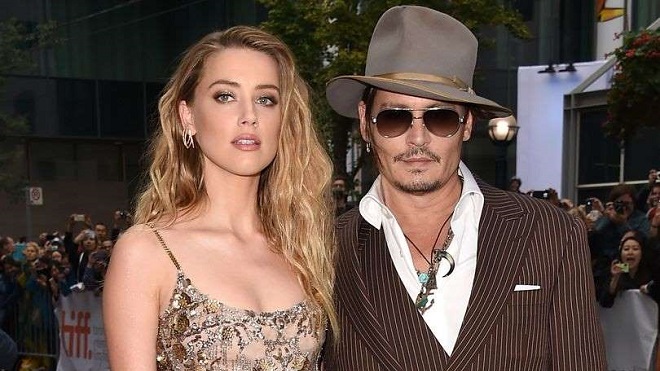 Amber Heard quyết ăn thua với Johnny Depp trong vụ kiện 50 triệu USD, sự thật không biết đầu mà lần