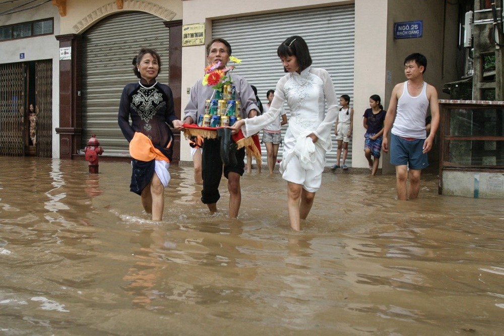 Cuộc sống sau ống kính: Quê tôi sống chung với lụt - Ảnh 8.