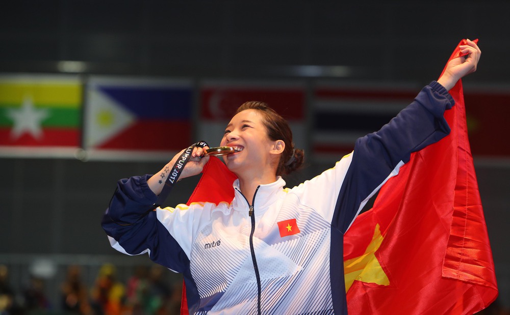 Chào mừng kỷ niệm Ngày Phụ nữ Việt Nam 20/10: Võ sĩ Dương Thúy Vi và cả thanh xuân dành cho Wushu - Ảnh 1.