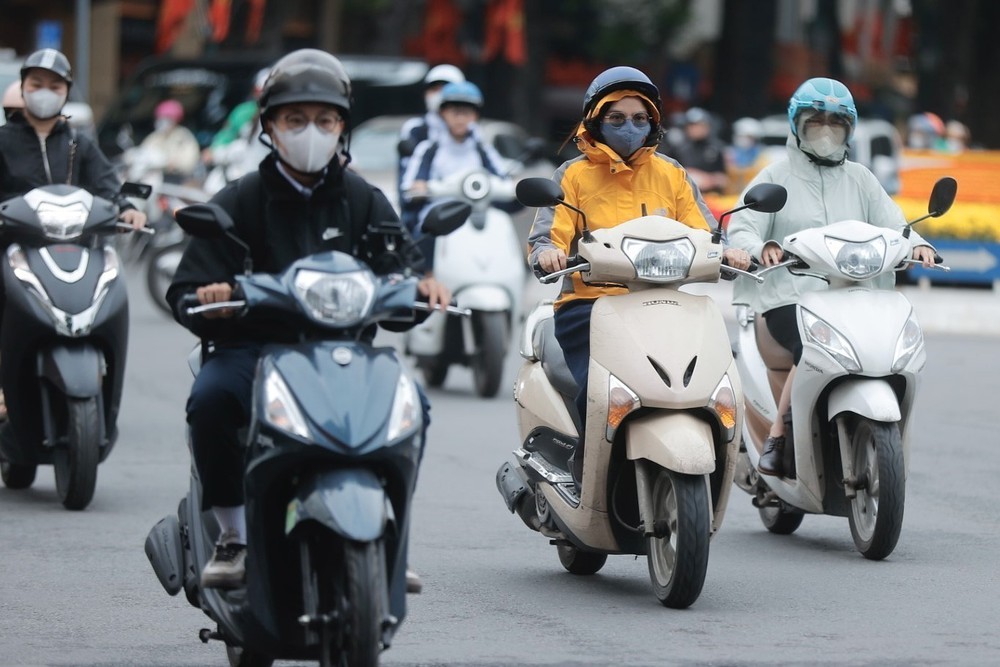 Hà Nội đón gió lạnh đầu mùa - Ảnh 5.