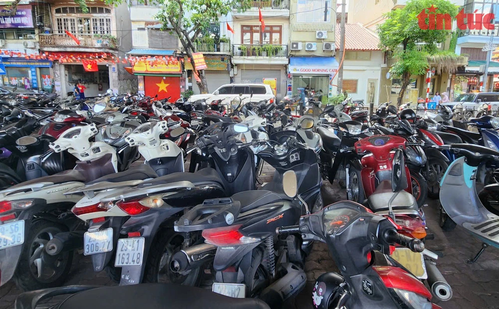 Hà Nội tổng kiểm tra hoạt động trông giữ phương tiện - Ảnh 1.