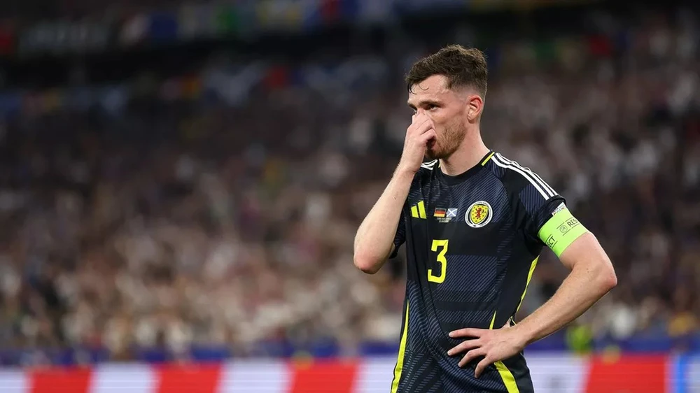 Robertson nghẹn ngào chia sẻ về Jota trong ngày Scotland giành tấm vé đi tiếp ở World Cup 2026 - Ảnh 1. Robertson nghẹn ngào chia sẻ về Jota trong ngày Scotland giành tấm vé đi tiếp ở World Cup 2026 - Ảnh 1.