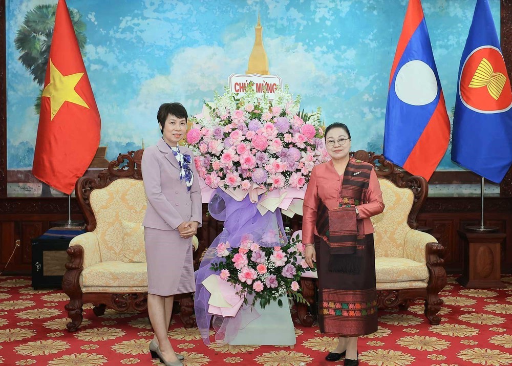 Tổng Giám đốc TTXVN chúc mừng 50 năm Quốc khánh nước Cộng hoà Dân chủ Nhân dân Lào - Ảnh 3.
