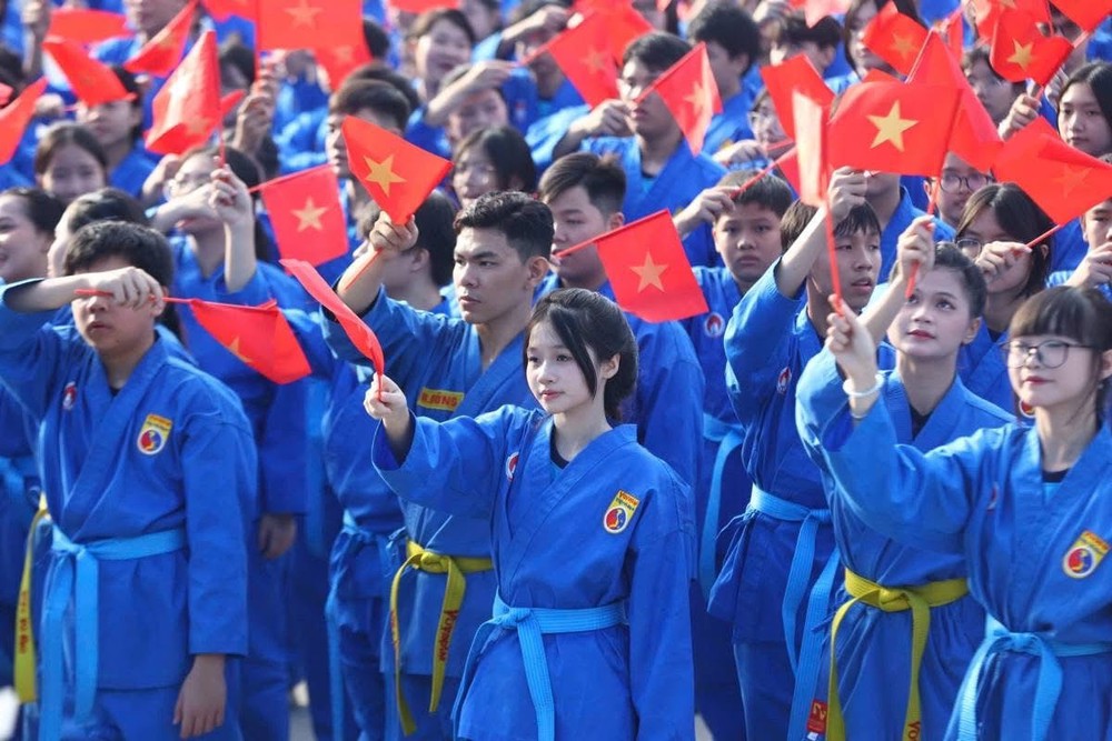 60.000 học sinh TP.HCM lập kỷ lục đồng diễn Vovinam - Khát vọng của tinh thần Việt Võ Đạo trong thế hệ trẻ - Ảnh 4. 60.000 học sinh TP.HCM lập kỷ lục đồng diễn Vovinam - Khát vọng của tinh thần Việt Võ Đạo trong thế hệ trẻ - Ảnh 4.
