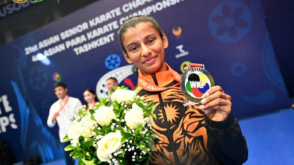 Võ sĩ Malaysia nhắm hat-trick HCV ở SEA Games 2025 sau màn ra mắt cực ấn tượng ở giải vô địch thế giới - Ảnh 1. Võ sĩ Malaysia nhắm hat-trick HCV ở SEA Games 2025 sau màn ra mắt cực ấn tượng ở giải vô địch thế giới - Ảnh 1.