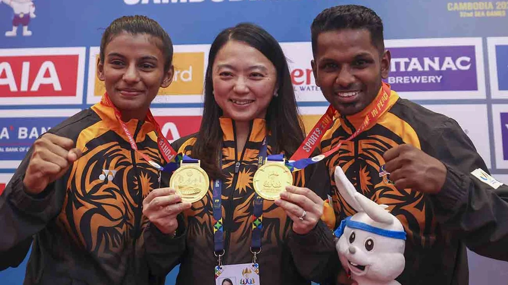 Võ sĩ Malaysia nhắm hat-trick HCV ở SEA Games 2025 sau màn ra mắt cực ấn tượng ở giải vô địch thế giới - Ảnh 2. Võ sĩ Malaysia nhắm hat-trick HCV ở SEA Games 2025 sau màn ra mắt cực ấn tượng ở giải vô địch thế giới - Ảnh 2.