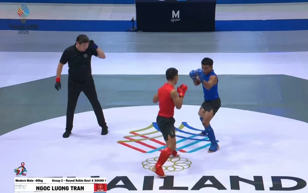 SEA Games 2025: Võ sĩ Việt Nam đánh bại nhà vô địch Thái Lan, chủ nhà khiếu nại nhưng trọng tài vẫn không đổi ý - Ảnh 1. SEA Games 2025: Võ sĩ Việt Nam đánh bại nhà vô địch Thái Lan, chủ nhà khiếu nại nhưng trọng tài vẫn không đổi ý - Ảnh 1.