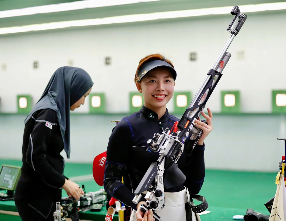 Nhan sắc gây thương nhớ của nữ xạ thủ Việt Nam phá kỷ lục SEA Games 2025 - Ảnh 5. Nhan sắc gây thương nhớ của nữ xạ thủ Việt Nam phá kỷ lục SEA Games 2025 - Ảnh 5.