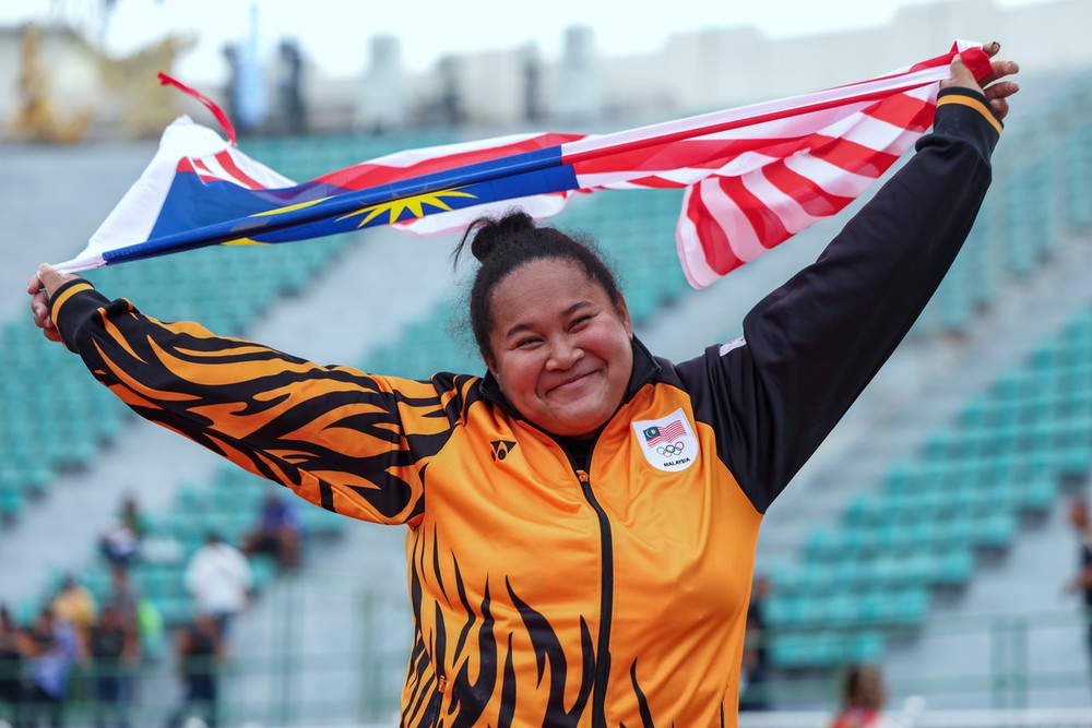 VĐV ném búa Malaysia phá 4 kỷ lục SEA Games liên tiếp chỉ trong một lần thi - Ảnh 2. VĐV ném búa Malaysia phá 4 kỷ lục SEA Games liên tiếp chỉ trong một lần thi - Ảnh 2.