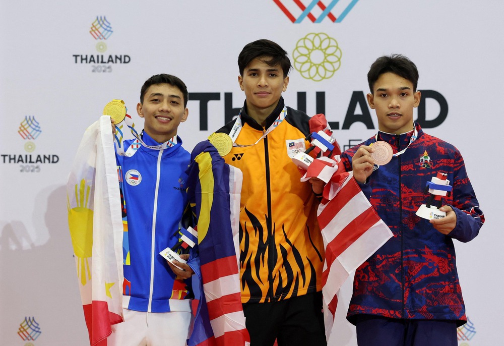 Bất ngờ ở SEA Games 2025 khi 2 VĐV cùng chia sẻ huy chương vàng - Ảnh 1. Bất ngờ ở SEA Games 2025 khi 2 VĐV cùng chia sẻ huy chương vàng - Ảnh 1.