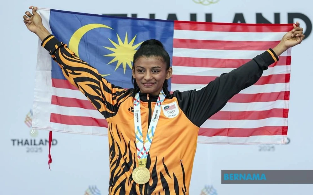 VĐV giành hat-trick HCV SEA Games trong ngày sinh nhật - Ảnh 1. VĐV giành hat-trick HCV SEA Games trong ngày sinh nhật - Ảnh 1.