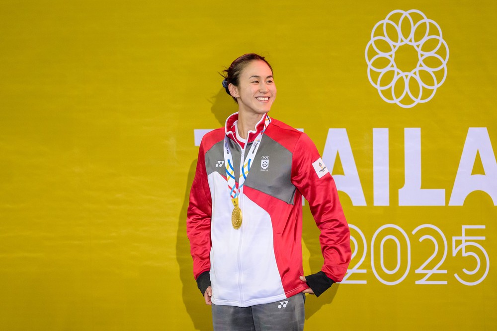 Niềm vui chiến thắng của nữ hoàng bơi lội Quah Ting Wen Niềm vui chiến thắng của nữ hoàng bơi lội Quah Ting Wen