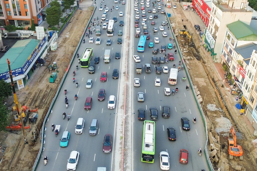 Hà Nội siết chặt kiểm soát bụi mịn từng bước nâng cao chất lượng không khí - Ảnh 11. Hà Nội siết chặt kiểm soát bụi mịn từng bước nâng cao chất lượng không khí - Ảnh 11.