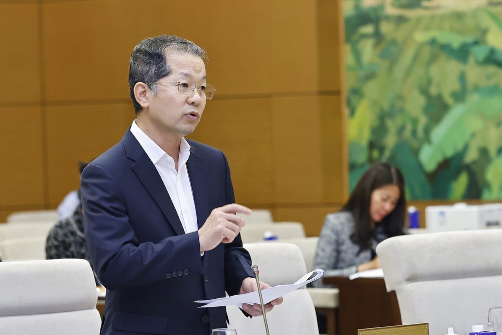 Phiên họp thứ 52 của Ủy ban Thường vụ Quốc hội: Đề nghị điều chỉnh mức doanh thu không phải nộp thuế của hộ kinh doanh - Ảnh 5. Phiên họp thứ 52 của Ủy ban Thường vụ Quốc hội: Đề nghị điều chỉnh mức doanh thu không phải nộp thuế của hộ kinh doanh - Ảnh 5.