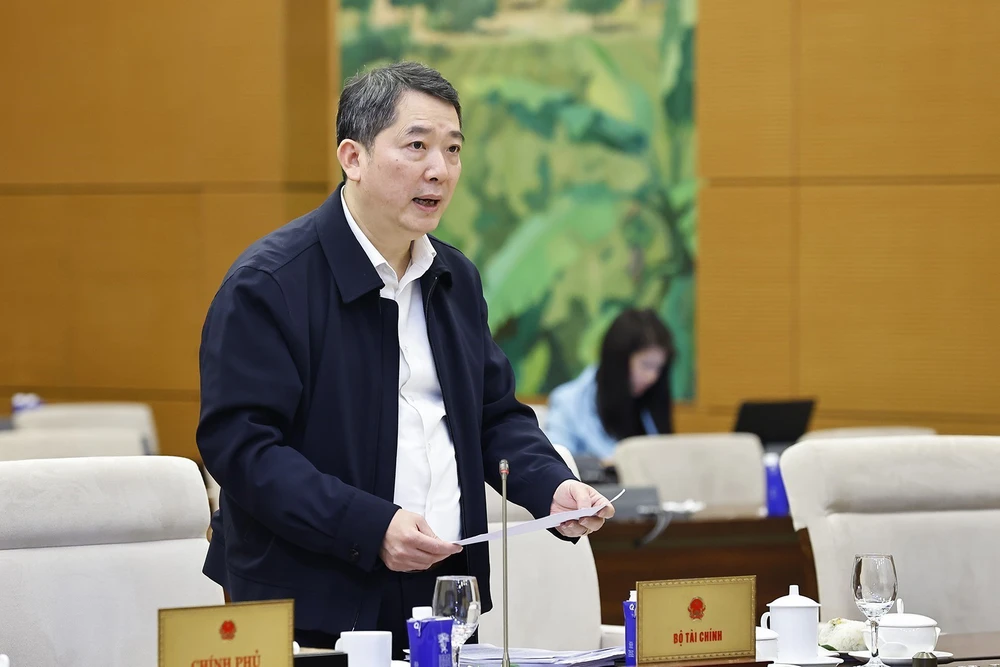 Phiên họp thứ 52 của Ủy ban Thường vụ Quốc hội: Đề nghị điều chỉnh mức doanh thu không phải nộp thuế của hộ kinh doanh - Ảnh 2. Phiên họp thứ 52 của Ủy ban Thường vụ Quốc hội: Đề nghị điều chỉnh mức doanh thu không phải nộp thuế của hộ kinh doanh - Ảnh 2.